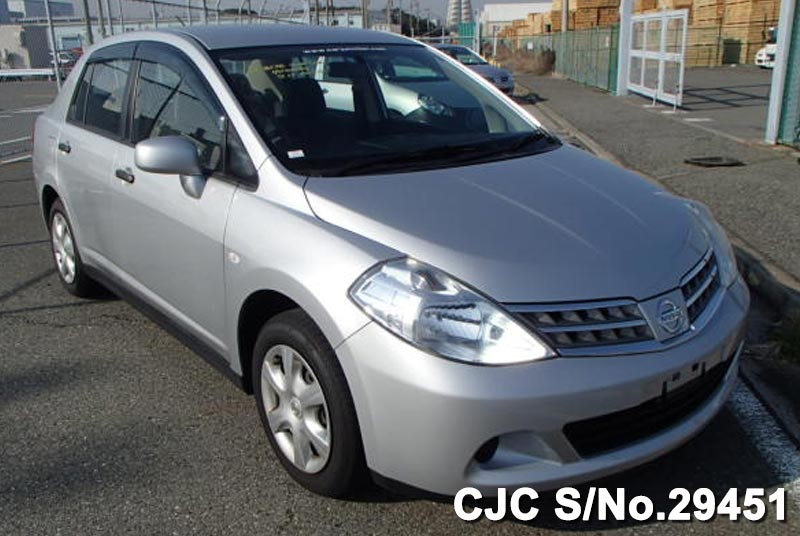 Ветровики nissan tiida latio