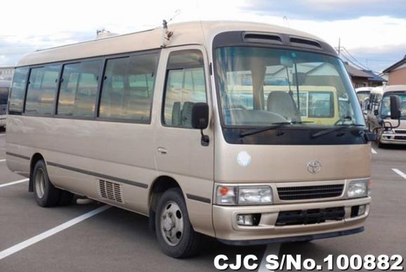 Toyota Coaster in Gold for Sale Image 0