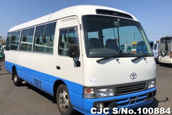 Toyota Coaster in White 2 Tone for Sale Image 0