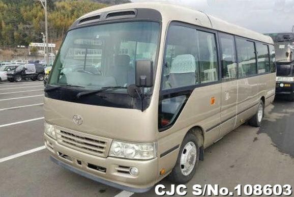 Toyota Coaster in Champagne for Sale Image 3
