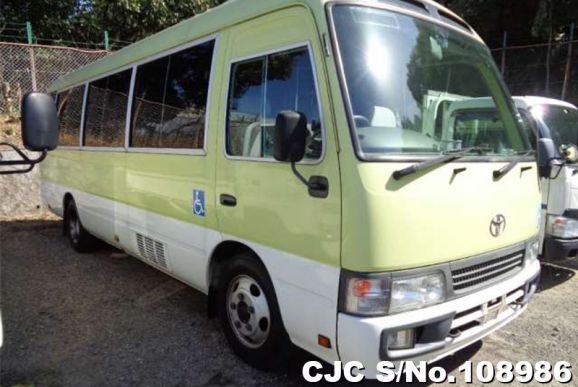 Toyota Coaster in Yellow for Sale Image 0